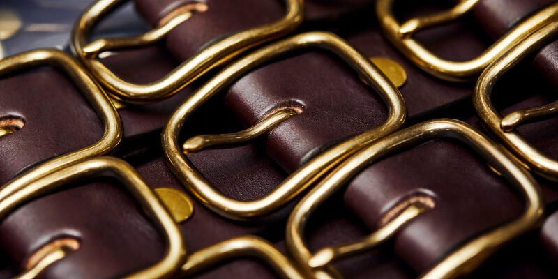 Stylish brass buckle for leather goods and leather belts